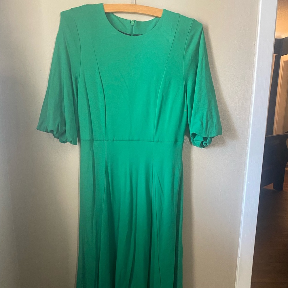 Gently used Boden dress in green. Wonderful movement and heavy fabric.